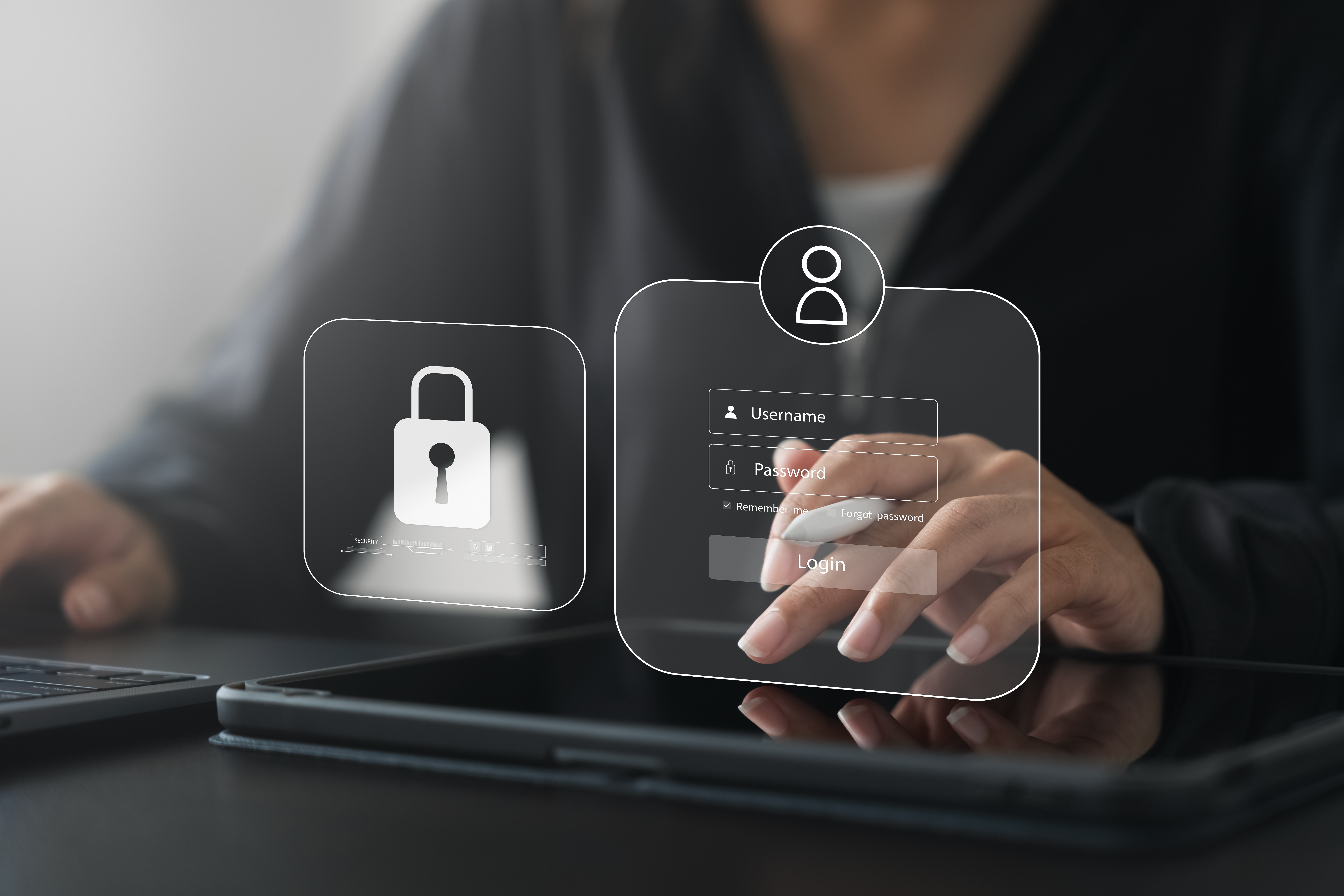 Person interacting with a tablet device, with holographic-style login interface elements showing username, password fields, and a padlock icon, symbolizing cybersecurity and secure login access.