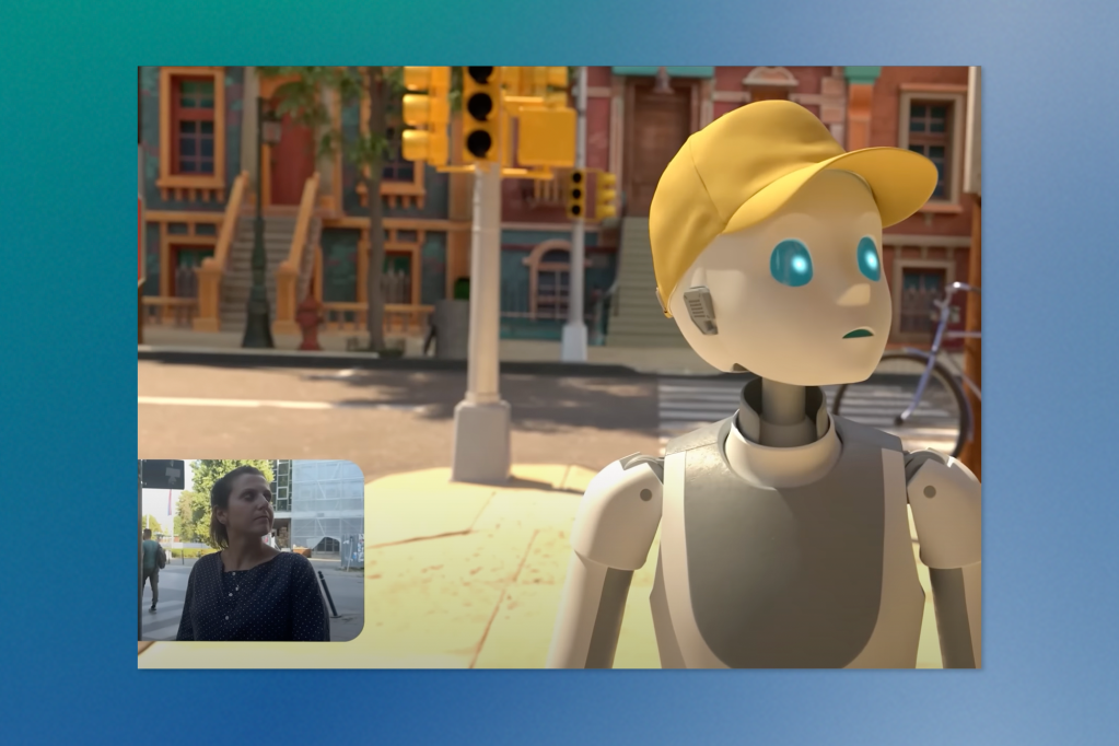 An animated scene featuring a cartoon robot or AI character with a yellow cap, blue eyes, and a white/gray body. The robot appears to be on a street with colorful buildings in the background. There's a small inset video showing a person with dark hair in a dark top, suggesting this might be from a video call or interactive experience.