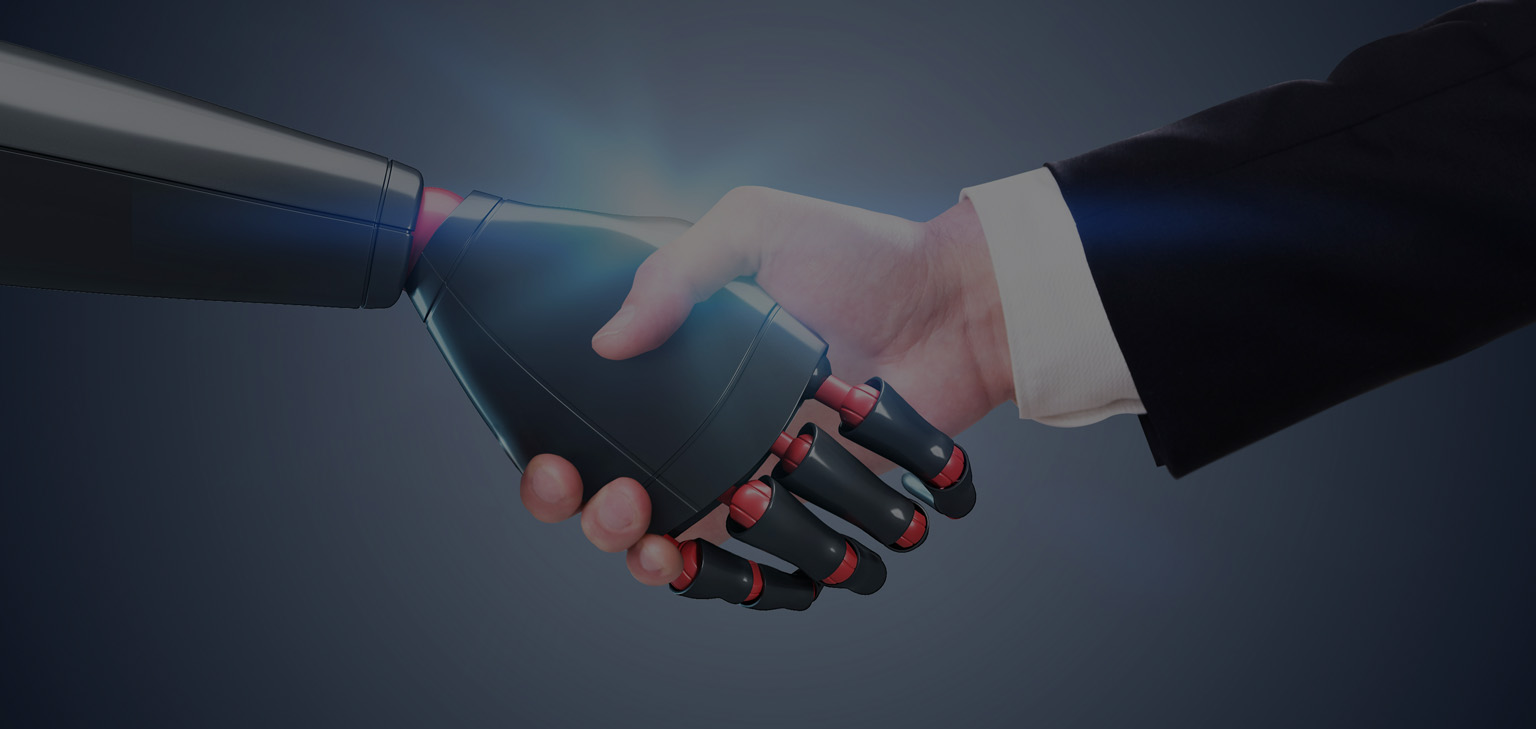 A close-up of a human hand in a business suit shaking hands with a robotic hand. The background is dark blue, symbolizing collaboration between humans and artificial intelligence in a professional context.