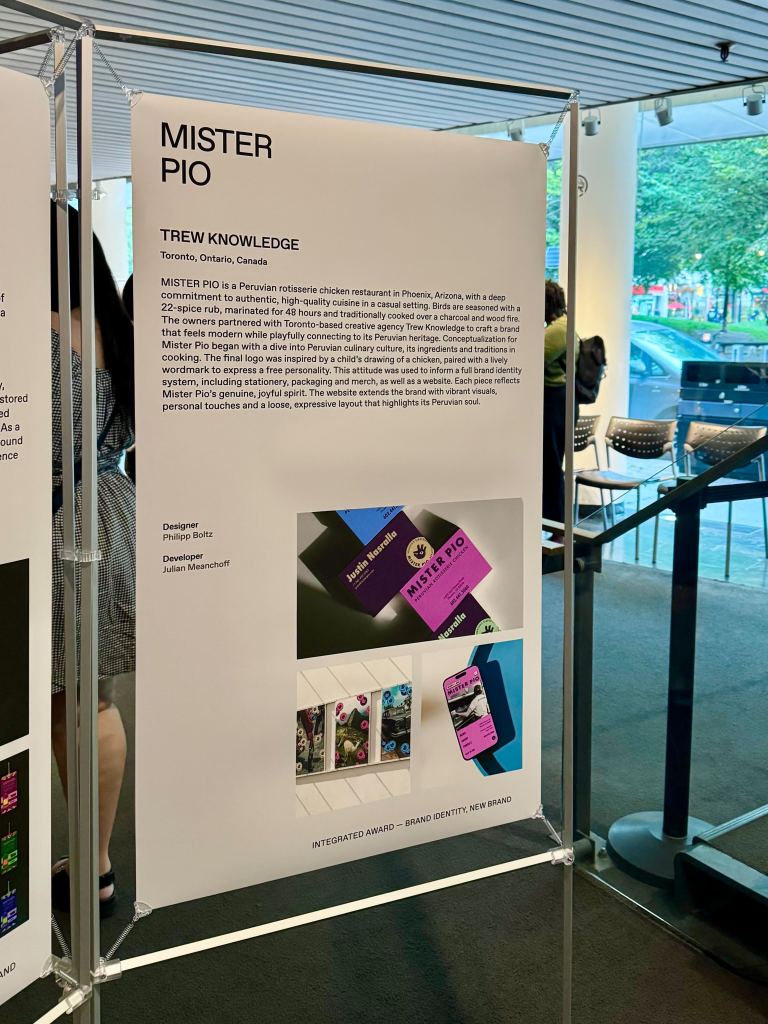 Poster display for Mister Pio at the DesignThinkers 2025 winners’ exhibition, featuring a detailed project description, designer and developer credits, and visuals of brand materials including packaging and mobile interface.