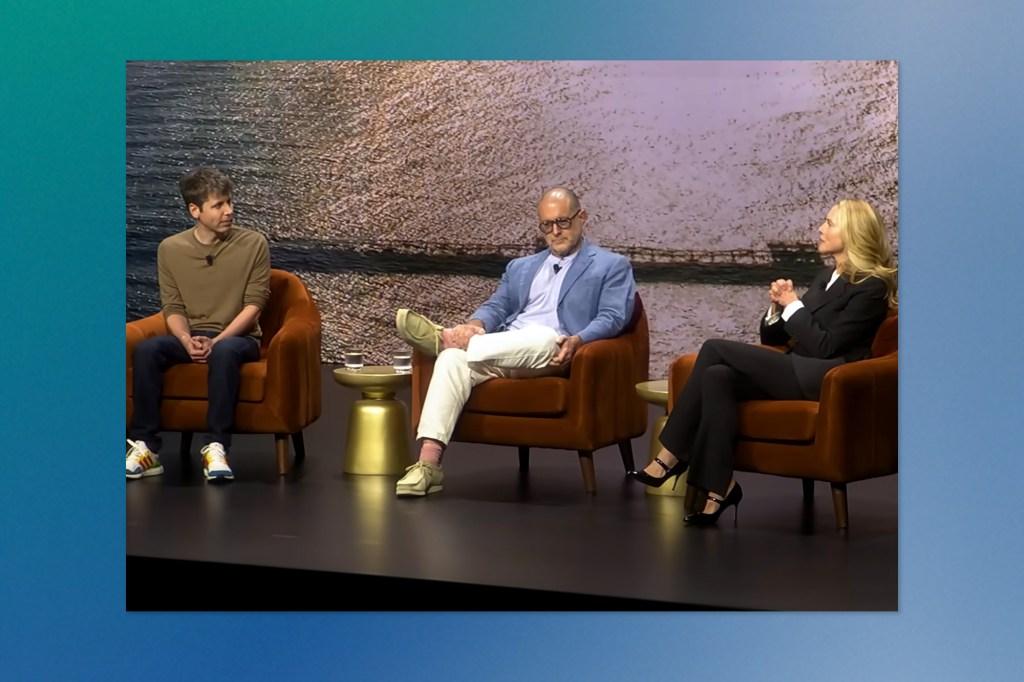 A panel discussion featuring Sam Altman on the left, Jony Ive in a blue blazer and glasses at the center, and Laurene Powell Jobs on the right. They are seated in brown armchairs on a stage with a textured backdrop resembling water or sand.