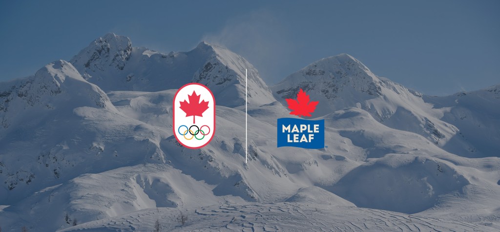 The Canadian Olympic Committee logo and the Maple Leaf Foods logo appear side by side over a backdrop of snow-covered mountains under a clear blue sky.