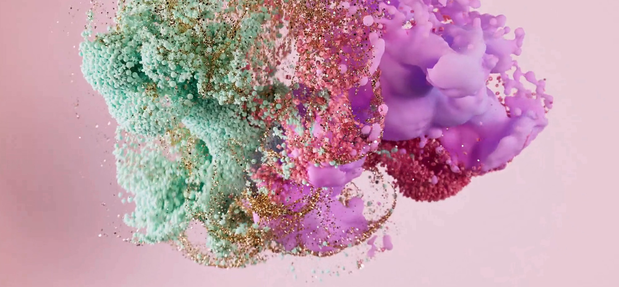 Abstract AI-inspired visual with colorful particles and fluid shapes in pink, green, and gold tones