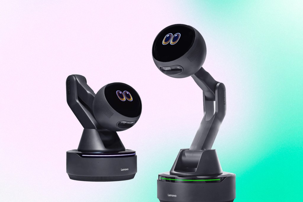 Two Lenovo AI companion robots with animated eye displays positioned on robotic arms against a soft gradient background.