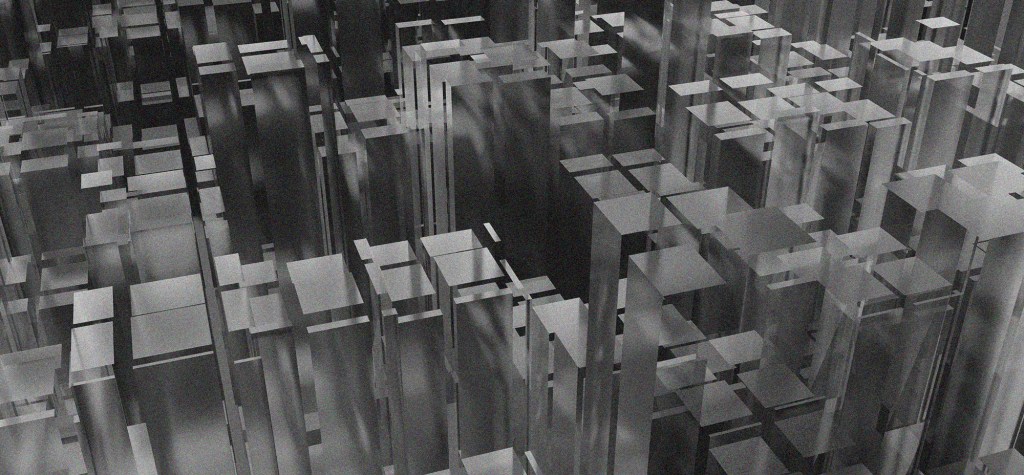 Monochrome abstract grid of geometric blocks resembling a dense, interconnected digital or urban system.