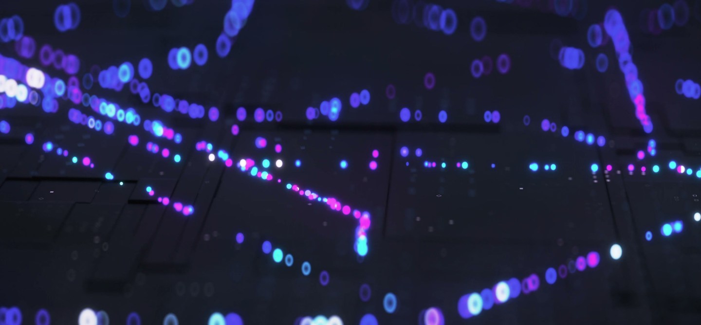 Abstract visualization of glowing blue and purple data points flowing across a dark digital surface, representing artificial intelligence, machine learning, and interconnected data systems.